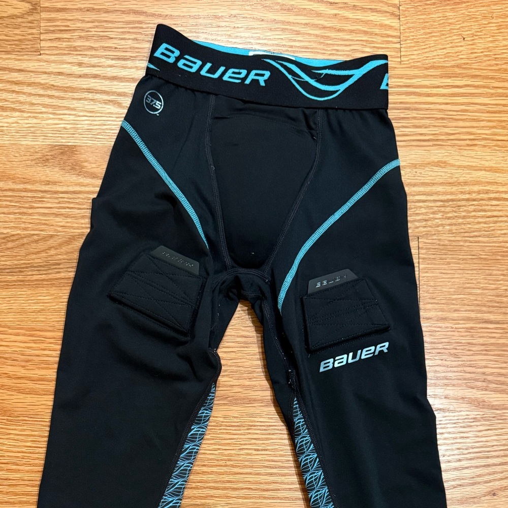 Girls Bauer Black and Teal Compression Fit Leggings